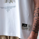 PEEKABOO TEE